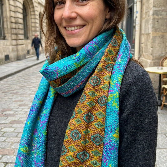 Customer wearing sari silk bead necklace and silk sari kantha shawl