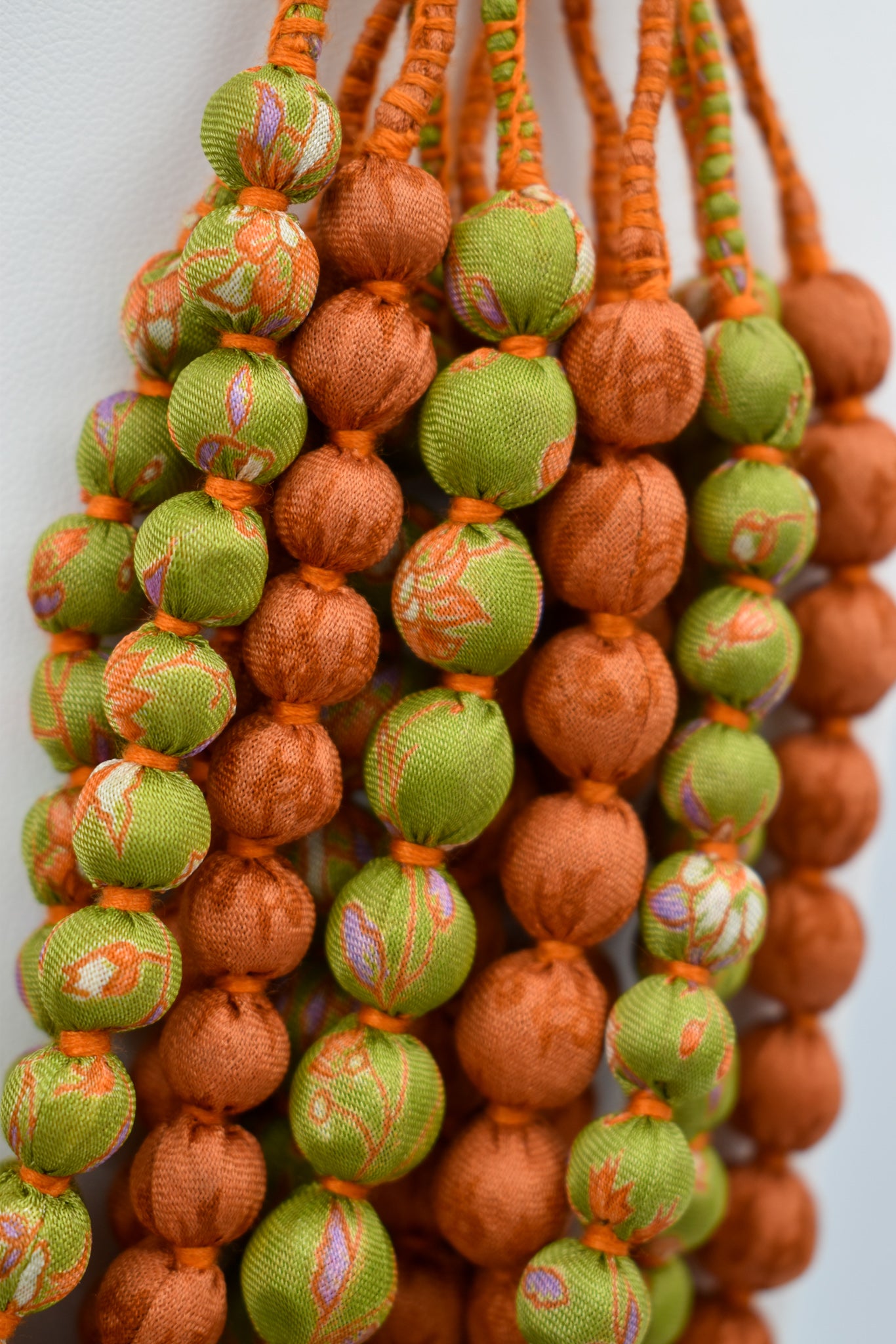 Maya — Sari Silk Bead Necklace, 12-String — Papaya — styling view
