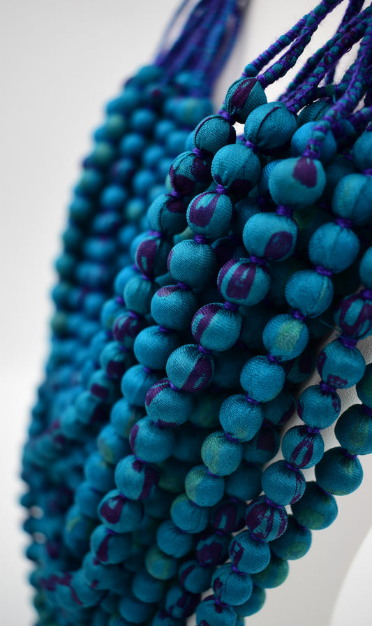 Peacock — Sari Silk Bead Necklace, 22-String — Teal and Purple — detail of beads