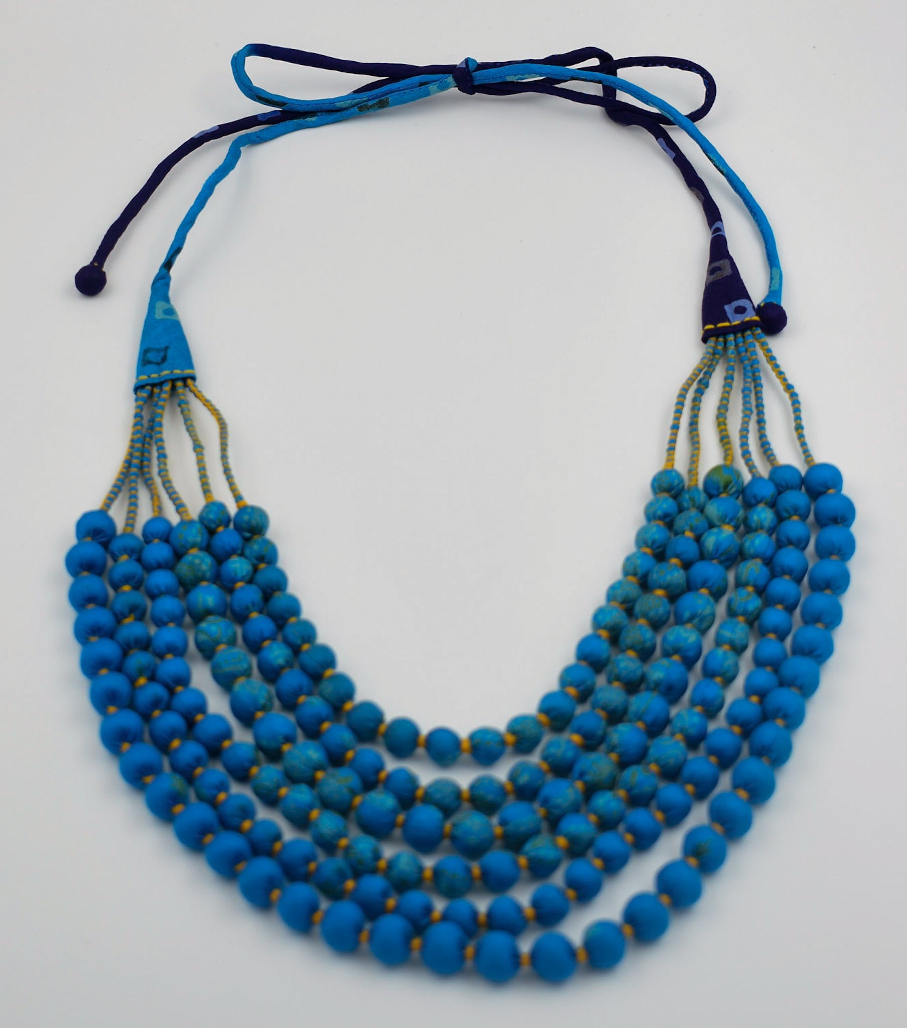 Curacao — Sari Silk Bead Necklace, 6-String — Vivid Blue — worn on neck