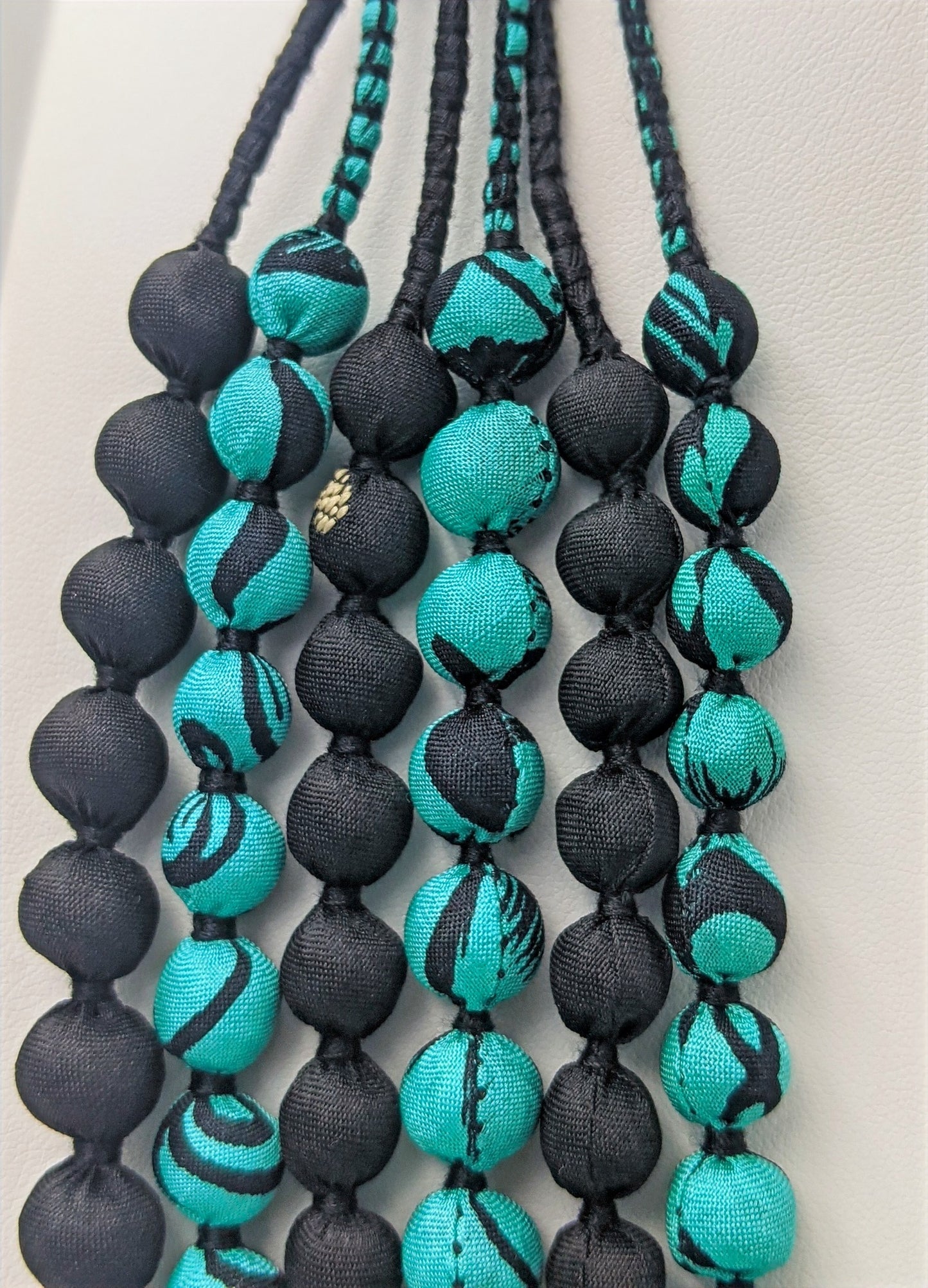 Sari Silk Bead Necklace, 6-String — Mint and Black — worn on neck