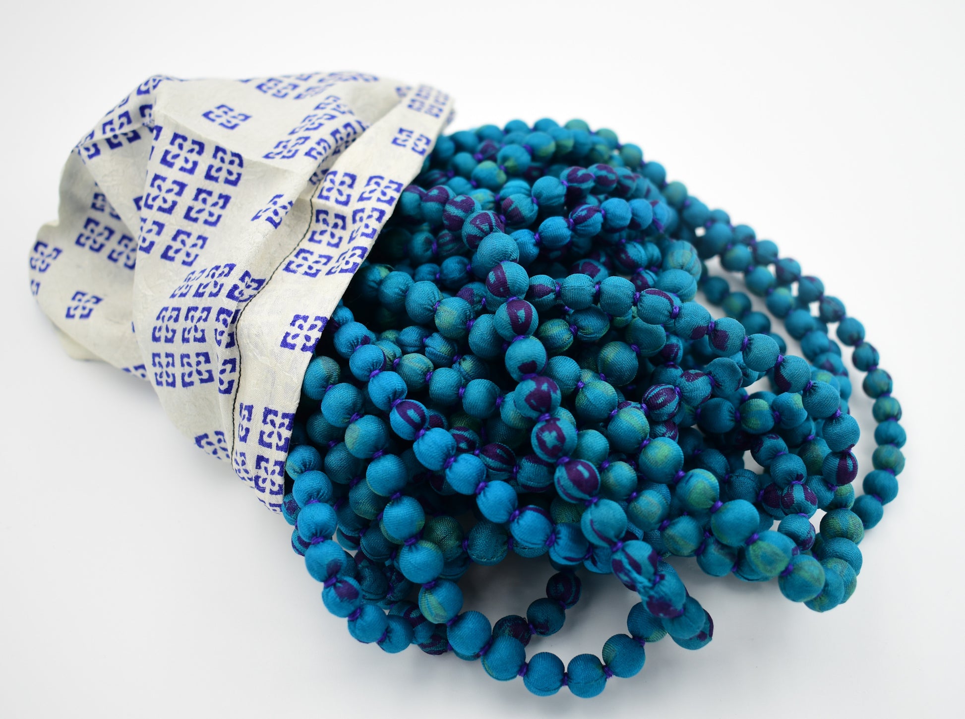 Peacock — Sari Silk Bead Necklace, 22-String — Teal and Purple — styling view