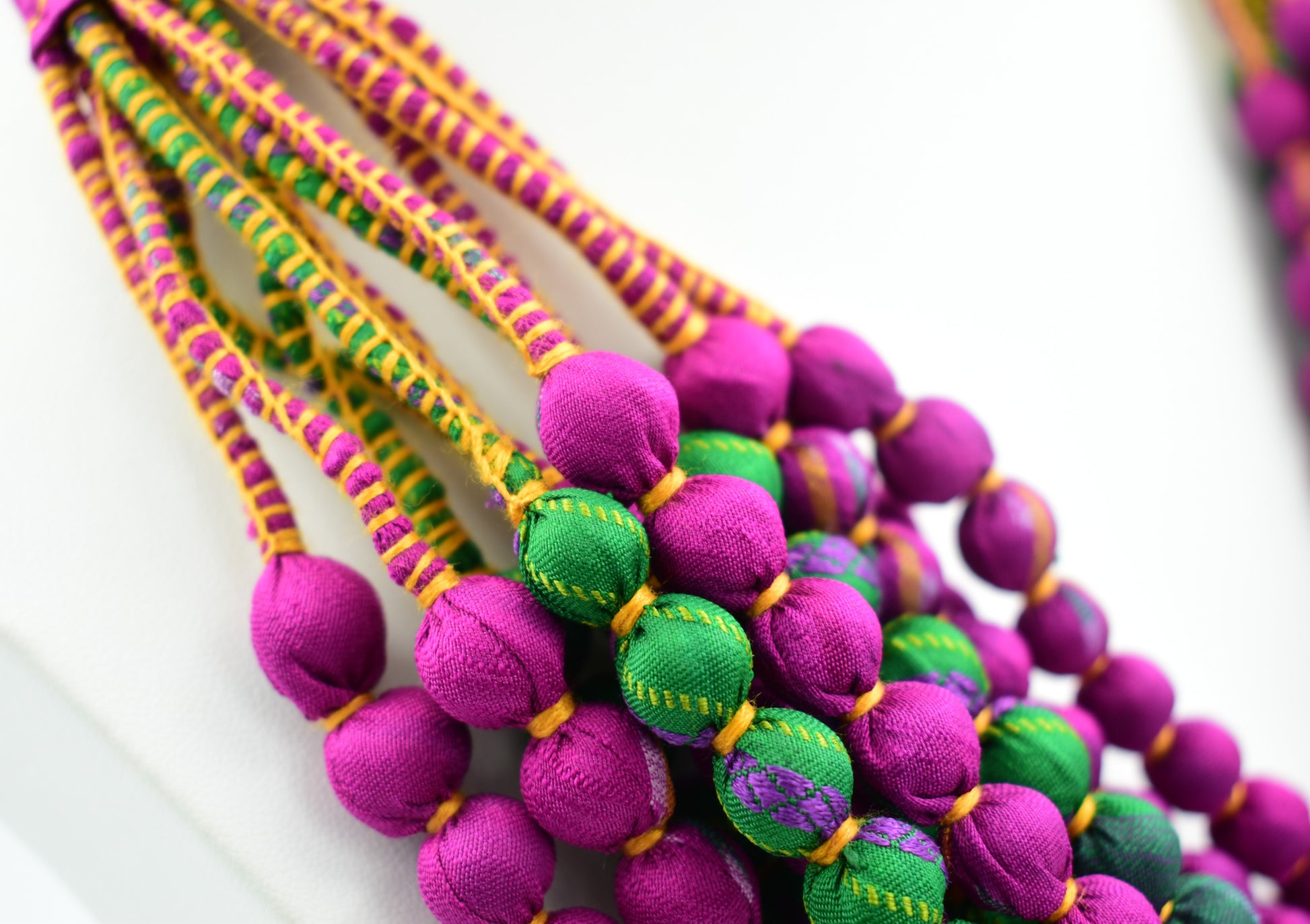 Coleus — Sari Silk Bead Necklace, 12-String — Fuchsia and Green — worn on neck