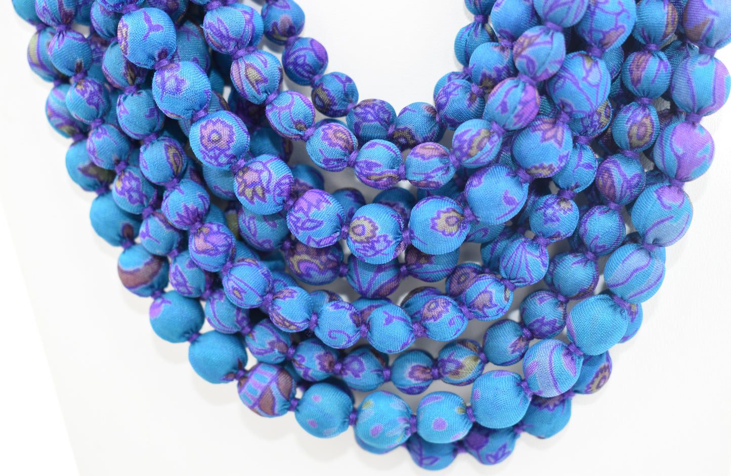 Sari Silk Bead Necklace, 12-String — Blue and Purple — worn on neck