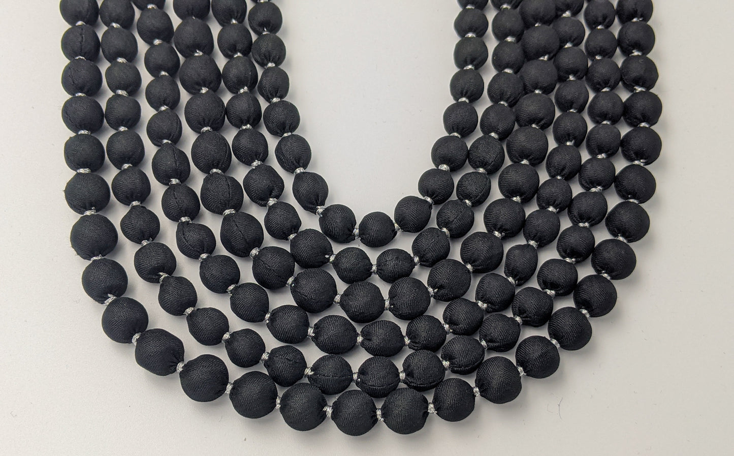 Sari Silk Bead Necklace, 6-String — Black and Silver — worn on neck