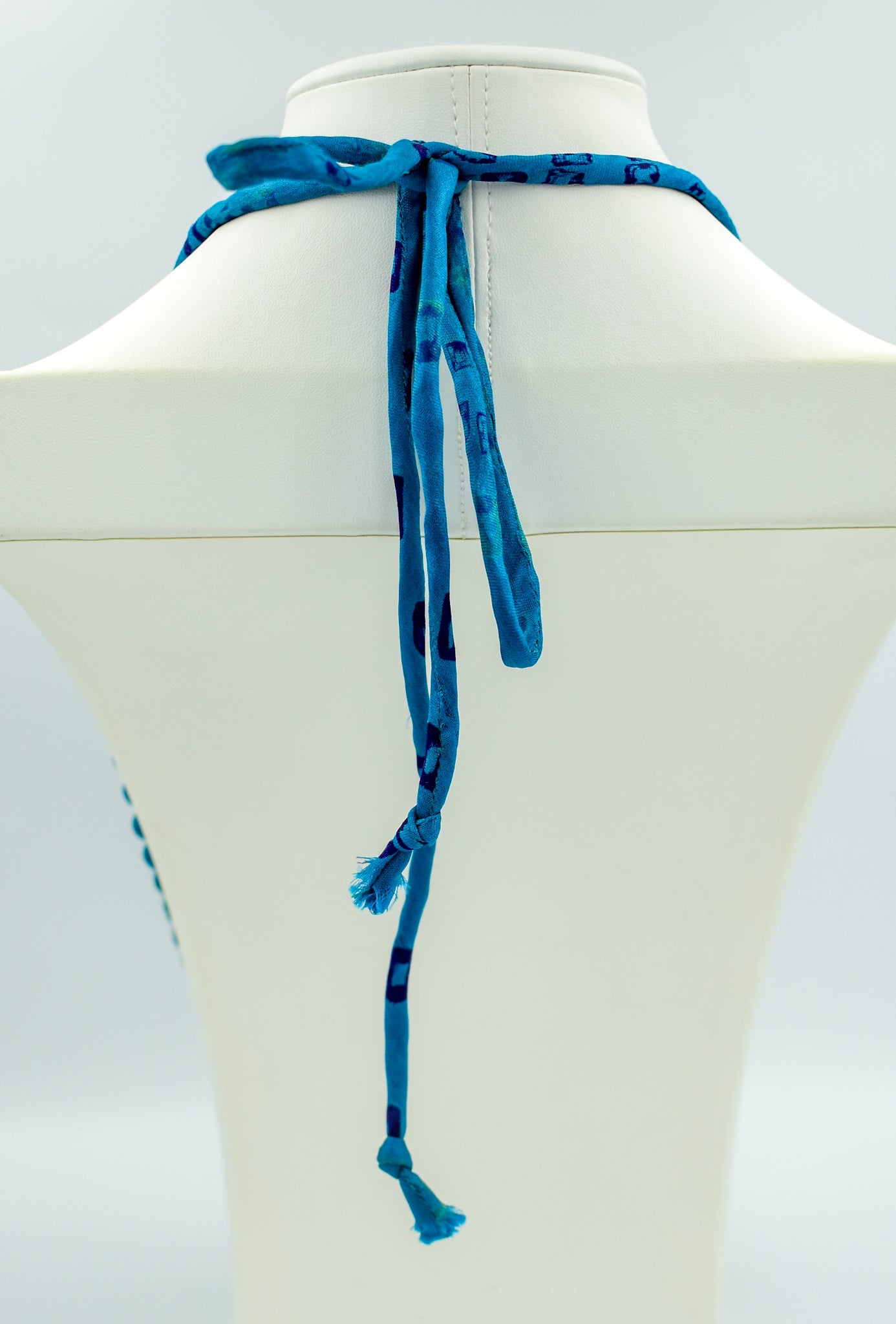 Peacock — Sari Silk Bead Necklace, 22-String — Teal and Purple — close-up detail