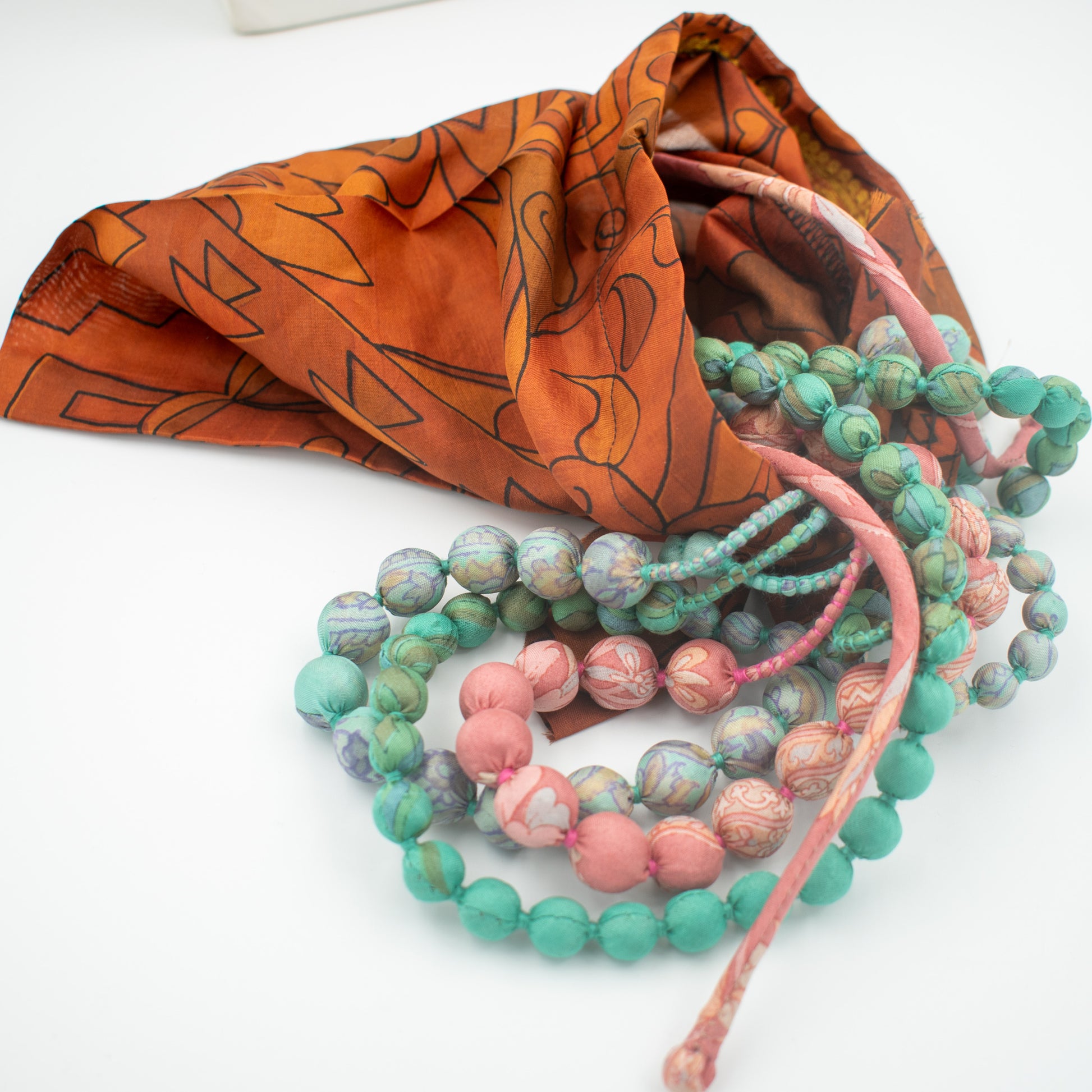 Sari Silk Bead Necklace, 5-String — Peach and Mint — worn on neck